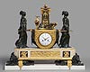A highly important Louis XVI gilt and patinated bronze and white marble mantel clock of eight day duration representing the Vestal Virgins Carrying the Sacred Fire, with movement by Pierre-Claude Raguet-Lépine